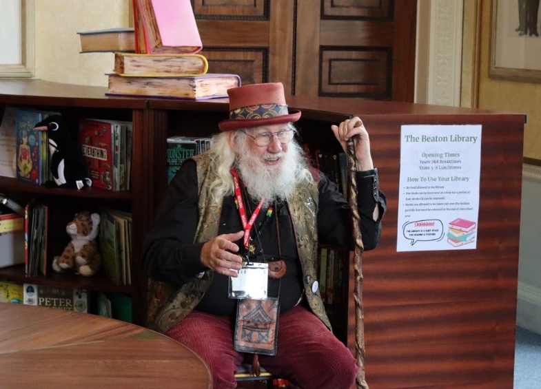 Storyteller John Row tells a story to Heath Mount pupils in the Beaton Library